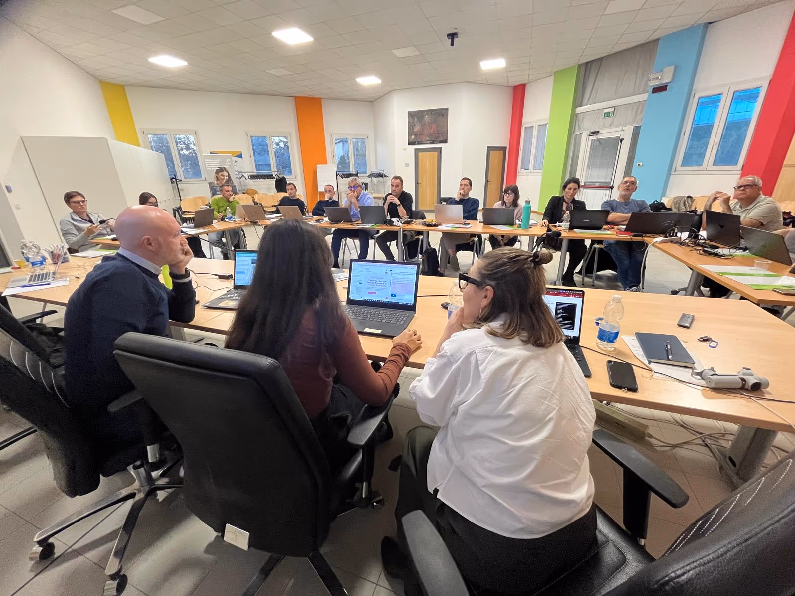 An open-plan studio with people working together